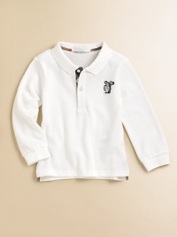 Pure and simple, a classic polo with long sleeves and the little knight appliqué in airy pique.Ribbed polo collarLong sleeves with ribbed cuffsButton placket with woven check trimAppliqué logo at chestSplit hemCottonMachine washImported Please note: Number of buttons may vary depending on size ordered. Pure and simple, a classic polo with long sleeves and the little knight appliqué in airy pique.Ribbed polo collarLong sleeves with ribbed cuffsButton placket with woven check trimAppliqué logo at chestSplit hemCottonMachine washImported Please note: Number of buttons may vary depending on size ordered.