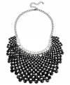 Beads are in beautiful abundance in this bib necklace from Haskell. Crafted from hematite-tone mixed metal, the necklace dazzles with glass baguette-shaped crystals. Approximate length: 14 inches + 3-inch extender. Approximate drop: 3-1/2 inches.