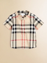 Fashioned in the renowned check design, this breezy cotton button-down features a shirttail hem and patch pocket.Button-down collarShort sleevesButton-frontFront patch pocketShirttail hemCottonMachine washImported Please note: Number of buttons may vary depending on size ordered. Fashioned in the renowned check design, this breezy cotton button-down features a shirttail hem and patch pocket.Button-down collarShort sleevesButton-frontFront patch pocketShirttail hemCottonMachine washImported Please note: Number of buttons may vary depending on size ordered.