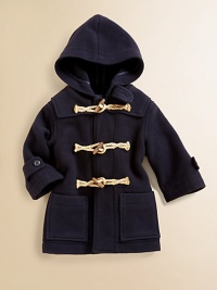 A handsome coat in luxurious felted wool is accented with a warm hood and toggle closures for a timeless heritage look.Attached hood with buttoned throat tabLong sleeves with button-tab cuffsWooden toggle closurePatch hand pocketsFully linedWoolMachine washImported Please note: Number of buttons may vary depending on size ordered. A handsome coat in luxurious felted wool is accented with a warm hood and toggle closures for a timeless heritage look.Attached hood with buttoned throat tabLong sleeves with button-tab cuffsWooden toggle closurePatch hand pocketsFully linedWoolMachine washImported Please note: Number of buttons may vary depending on size ordered.