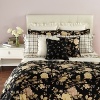 Silhouetted blossoms cascade across a bold black ground with hints of sage, pale yellow and rose on duvets, comforters and shams in this classic bedding collection.