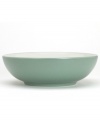 Mix and match these splashes of color for a tabletop with endless possibility! The modern coupe shape and two-tone hues mean this round vegetable bowl will bring life to any décor. Select pieces in your favorite shades to create a customized dinnerware collection.