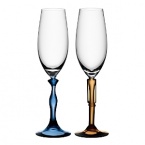 The Two Of Us champagne glasses are a tribute to everlasting love and the joy of finding that person who will always stand by you. Designed by Kjell Engman for Kosta Boda.