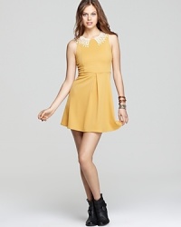 This Free People dress exudes girlish charm with a dainty crochet collar and sweet silhouette. This Free People dress exudes girlish charm with a dainty crochet collar and sweet silhouette.