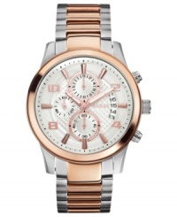 Steal some style from the guys with this classic steel watch from GUESS. Steal some style from the guys with this classic steel watch from GUESS.
