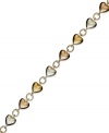 A romantic twist. Giani Bernini's tri-tone heart bracelet combines sterling silver, 24k gold and 24k rose gold over sterling silver. Approximate length: 7-1/4 inches.