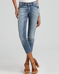 Subtle distressing and a faded wash lend a cool vintage feel to these 7 For All Mankind cropped skinnies. Subtle distressing and a faded wash lend a cool vintage feel to these 7 For All Mankind cropped skinnies.