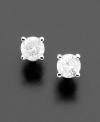 Simply striking, these brilliant round-cut diamond earring studs (1/4 ct. t.w.) rest in an elegant white gold setting.