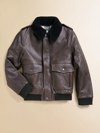 Your young ace can luxuriate in the deep warmth and rustic refinement of rich lambskin with plush, soft shearling from Italy in this stunning classic.Shearling collarShoulder epaulettesLong sleeves with knit cuffsSnap closeDouble front snap and zip pocketsKnit waistbandPieced backLambskin and shearlingDry clean by leather professionalMade in ItalyFur origin: Italy Your young ace can luxuriate in the deep warmth and rustic refinement of rich lambskin with plush, soft shearling from Italy in this stunning classic.Shearling collarShoulder epaulettesLong sleeves with knit cuffsSnap closeDouble front snap and zip pocketsKnit waistbandPieced backLambskin and shearlingDry clean by leather professionalMade in ItalyFur origin: Italy