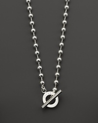 A bold toggle finishes this gleaming sterling silver necklace. A bold toggle finishes this gleaming sterling silver necklace.