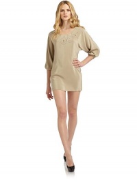THE LOOKScalloped eyelet details the neckline¾ sleeves with elastic cuffsTHE FITAbout 31 from shoulder to hemTHE MATERIALSilkCARE & ORIGINDry cleanImportedModel shown is 5'10 (177cm) wearing US size 4. THE LOOKScalloped eyelet details the neckline¾ sleeves with elastic cuffsTHE FITAbout 31 from shoulder to hemTHE MATERIALSilkCARE & ORIGINDry cleanImportedModel shown is 5'10 (177cm) wearing US size 4.