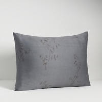 Delicate fronds in plum and pewter on a muted textured background. In 280-thread count combed cotton sateen. Imported.