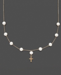 The perfect First Communion gift for a special little girl. This necklace features cultured freshwater pearls (5-6 mm) and a petite 14k gold cross charm. Set in 14k gold. Approximate length: 13 inches. Approximate drop: 1/2 inch. The perfect First Communion gift for a special little girl. This necklace features cultured freshwater pearls (5-6 mm) and a petite 14k gold cross charm. Set in 14k gold. Approximate length: 13 inches. Approximate drop: 1/2 inch.