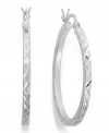 An intricate etched design reflects the light on Giani Bernini's luminous hoop earrings. Crafted in sterling silver. Approximate diameter: 1-1/4 inches.