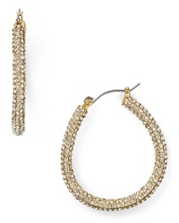 Nail this season's statement earring trend with pair of hoop earrings from ABS by Allen Schwartz, accented by delicate pave stones. Nail this season's statement earring trend with pair of hoop earrings from ABS by Allen Schwartz, accented by delicate pave stones.