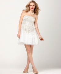 A sweet smattering of sparkling sequins and a sheer tulle overlay give this Adrianna Papell dress charming appeal. (Clearance) A sweet smattering of sparkling sequins and a sheer tulle overlay give this Adrianna Papell dress charming appeal. (Clearance)