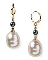 These gold vermeil drop earrings with pearls from Majorica are a staple for your jewelry box. For any occasion or event, they'll be your go-to. These gold vermeil drop earrings with pearls from Majorica are a staple for your jewelry box. For any occasion or event, they'll be your go-to.