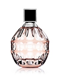 Imagine femininity, luxury and style…bottled. Introducing Jimmy Choo, the fragrance. Expressing an aura of strength and beauty, glamour and confidence, it is inspired by modern women. Luminous green top notes, a heart of rich and exotic Tiger Orchid, and lingering sensual base notes of sweet toffee and Indonesian Patchouli leave a sensual memory on the skin. 3.3 oz.