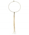 Tickle your neckline with a shimmery tassel. This chic necklace by GUESS features a collar design finished with a long tassel. Crafted in gold tone mixed metal. Approximate length: 15 inches. Approximate drop: 9 inches.