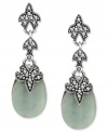 Earthy elegance. Genevieve & Grace's teardrop earrings are crafted from sterling silver, with a flower motif, as well as marcasite and jade (33 ct. t.w.) adding to the appeal. Approximate drop: 1-5/8 inches.