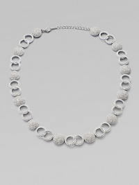 A gorgeous piece featuring circles and links accented with brilliant pavé crystals. CrystalsRhodium-plated brassLength, about 16 to 18 adjustableLobster clasp closureImported A gorgeous piece featuring circles and links accented with brilliant pavé crystals. CrystalsRhodium-plated brassLength, about 16 to 18 adjustableLobster clasp closureImported
