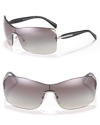 Shield sunglasses are a must-have this season and Prada has created the perfect pair featuring stylish gradient lenses. Shield sunglasses are a must-have this season and Prada has created the perfect pair featuring stylish gradient lenses.