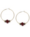 Style takes center stage in this pair of hoop earrings from Kenneth Cole New York. Crafted from gold-tone mixed metal, the earrings are offset with hematite-tone spacers surrounding red pave crystal accents for fashionable appeal. Approximate drop: 2-1/4 inches.