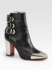 Buckle straps and a metal wing-tip modernize this expertly crafted ankle boot of supple leather. Lacquered heel, 3½ (90mm)Leather upper with metal wing-tipSide zip and buckle strapsLeather liningSignature red leather solePadded insoleMade in Italy Buckle straps and a metal wing-tip modernize this expertly crafted ankle boot of supple leather. Lacquered heel, 3½ (90mm)Leather upper with metal wing-tipSide zip and buckle strapsLeather liningSignature red leather solePadded insoleMade in Italy