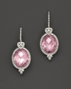 Faceted oval pink crystals are topped with romantic heart detailing.