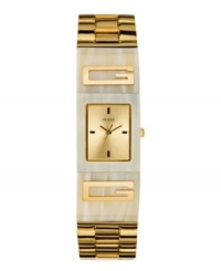 Embrace glamour with this chic watch featuring classic GUESS style. Embrace glamour with this chic watch featuring classic GUESS style.