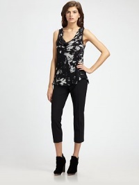 An exploded flower pattern and elegant draped neckline gives this sleeveless blouse a dash of feminine glamour.Cowl neckSleeveless with ribbed trimRuffled hem58% silk/42% bambooDry cleanImported of Italian materials An exploded flower pattern and elegant draped neckline gives this sleeveless blouse a dash of feminine glamour.Cowl neckSleeveless with ribbed trimRuffled hem58% silk/42% bambooDry cleanImported of Italian materials