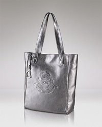 Take a shine to practical accessorizing with this tote from Lauren Ralph Lauren. Crafted from leather with an embossed logo, it's the perfect essential for the girl on the go. Take a shine to practical accessorizing with this tote from Lauren Ralph Lauren. Crafted from leather with an embossed logo, it's the perfect essential for the girl on the go.