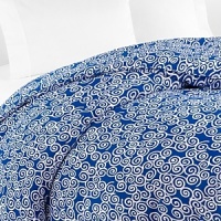 With a swirling pattern reminiscent of Asian woodcuts, this fresh DIANE von FURSTENBERG twin duvet cover brings sunny charm to both modern and vintage-inspired decor.