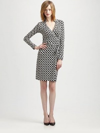 The iconic wrap styled with a chic point collar, all in supple silk jersey.V necklineLong sleevesWrap-frontSelf-beltAbout 22 from natural waistSilkDry cleanImportedModel shown is 5'9 (175cm) wearing US size 4. The iconic wrap styled with a chic point collar, all in supple silk jersey.V necklineLong sleevesWrap-frontSelf-beltAbout 22 from natural waistSilkDry cleanImportedModel shown is 5'9 (175cm) wearing US size 4.