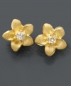 Start growing her garden of jewelry with these textured 14k gold flower stud earrings featuring diamond accents at center.