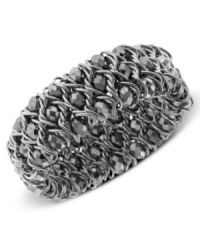 Mood changer. Dark and alluring glass crystals lend an elegant effect to 2028's stretch bracelet. Crafted in silver tone mixed metal. Stretches to fit wrist. Approximate length: 7 inches. Mood changer. Dark and alluring glass crystals lend an elegant effect to 2028's stretch bracelet. Crafted in silver tone mixed metal. Stretches to fit wrist. Approximate length: 7 inches.