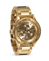A classic design with cool appeal, Nixon's gold-plated chronograph is a strong choice. This oversized watch looks sleek worn with a suit and stylish worn with jeans and a tee. A classic design with cool appeal, Nixon's gold-plated chronograph is a strong choice. This oversized watch looks sleek worn with a suit and stylish worn with jeans and a tee.
