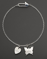 Proclaim your love for Gucci with these logo-embossed sterling silver heart and butterfly charms, strung on an elegant chain. Proclaim your love for Gucci with these logo-embossed sterling silver heart and butterfly charms, strung on an elegant chain.