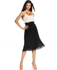 Take your look to new lengths this season with MM Couture's pleated midi skirt! Take your look to new lengths this season with MM Couture's pleated midi skirt!