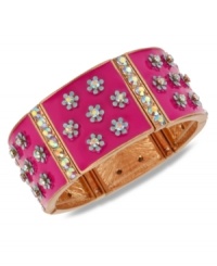 Flower power. Betsey Johnson's slip-on stretch bracelet features a pink design decorated with flowers and crystal accents. Set in antiqued gold tone mixed metal. Approximate length: 7-1/2 inches. Approximate width: 1 inch. Flower power. Betsey Johnson's slip-on stretch bracelet features a pink design decorated with flowers and crystal accents. Set in antiqued gold tone mixed metal. Approximate length: 7-1/2 inches. Approximate width: 1 inch.