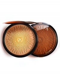This summer, Guerlain introduces Terra Soleia: a complexion-enhancing bronzing powder that is a must-have for sun-kissed skin. With its universal shade mixed with iridescent golden particles, you will be left with a naturally luminous tan. Apply Terra Soliea to face, shoulders, neck and décolleté to enhance any tan with a subtle golden shimmery effect. Made in France. 0.95 oz. This summer, Guerlain introduces Terra Soleia: a complexion-enhancing bronzing powder that is a must-have for sun-kissed skin. With its universal shade mixed with iridescent golden particles, you will be left with a naturally luminous tan. Apply Terra Soliea to face, shoulders, neck and décolleté to enhance any tan with a subtle golden shimmery effect. Made in France. 0.95 oz.