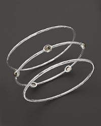 This set of three sterling silver bangles from Ippolita makes the perfect unforgettable gift. This set of three sterling silver bangles from Ippolita makes the perfect unforgettable gift.