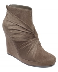 Like a present for you feet. Impo's Taborri wedges feature faux wrap detail on the vamp and a covered wedge heel. Like a present for you feet. Impo's Taborri wedges feature faux wrap detail on the vamp and a covered wedge heel.