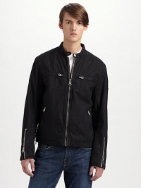 A lightweight, easy-wearing update on the classic motocross look, styled in carbon-coated canvas with a banded collar and reinforced zippers allover. Zip front Banded collar Chest, waist zip pockets Sleeve zips Cotton twill lining About 25 from shoulder to hem Cotton Machine wash Imported A lightweight, easy-wearing update on the classic motocross look, styled in carbon-coated canvas with a banded collar and reinforced zippers allover. Zip front Banded collar Chest, waist zip pockets Sleeve zips Cotton twill lining About 25 from shoulder to hem Cotton Machine wash Imported