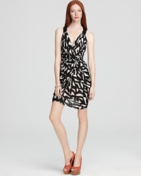 With a deep v neck and exposed back, this BCBGeneration dress puts a dressy spin on daytime. Travel through your schedule with a touch of allure, then head decadently into evening. With a deep v neck and exposed back, this BCBGeneration dress puts a dressy spin on daytime. Travel through your schedule with a touch of allure, then head decadently into evening.