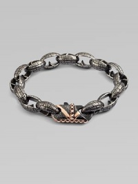 Modern update, enhanced by exquisite details define this rhodium and rose gold plated steel bracelet with brushed matte finish.From the UK CollectionSteelLength, about 9Lobster clasp closureImported