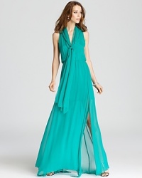Imbued with a potent hue, this BCBGMAXAZRIA gown is fashioned in gauzy silk for a light-as-air feel. Imbued with a potent hue, this BCBGMAXAZRIA gown is fashioned in gauzy silk for a light-as-air feel.