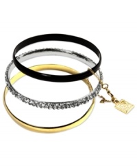 Stack on the perfect trio of bangles, by Anne Klein. This set of 3 bracelets features chain-connected gold tone, jet tone, and silver tone designs. Silver style embellished with glass stone accents. Crafted in gold tone mixed metal. Approximate diameter: 2-1/2 inches. Stack on the perfect trio of bangles, by Anne Klein. This set of 3 bracelets features chain-connected gold tone, jet tone, and silver tone designs. Silver style embellished with glass stone accents. Crafted in gold tone mixed metal. Approximate diameter: 2-1/2 inches.