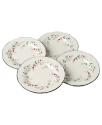 A classic holly print with embossed accents and a scalloped edge make Pfaltzgraff Winterberry salad plates a festive addition to holiday tables.
