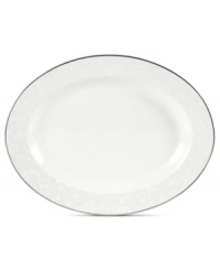 Gracefully understated, the Tanglewood oval platter by Mikasa is swept with romantic scrolling florals in pure white. A polished platinum edge refines already-elegant porcelain to enhance every occasion. Gracefully understated, the Tanglewood oval platter by Mikasa is swept with romantic scrolling florals in pure white. A polished platinum edge refines already-elegant porcelain to enhance every occasion.